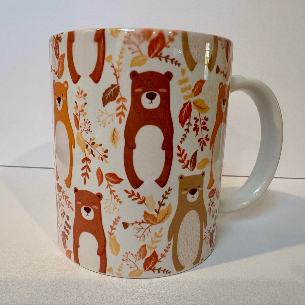 Cozy Autumn Bear Mug with Leaves